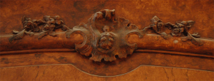 Sculpted copies of 18th century style floral door ornaments.